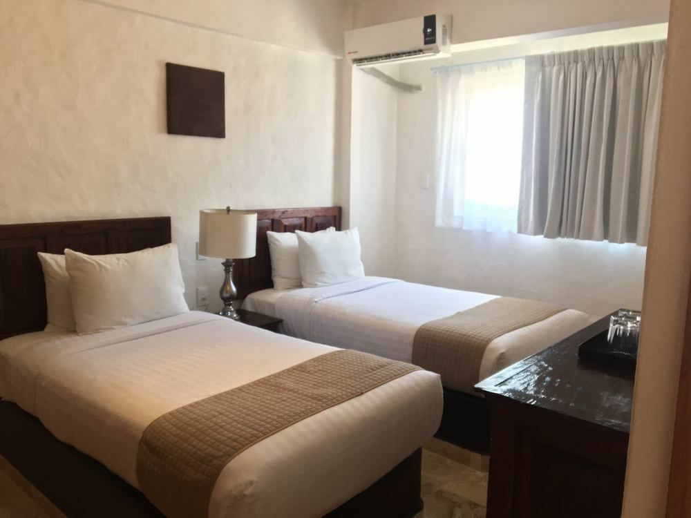 Hotel Suites Mar Elena (Adults Only) بويرتو فالارتا المظهر الخارجي الصورة